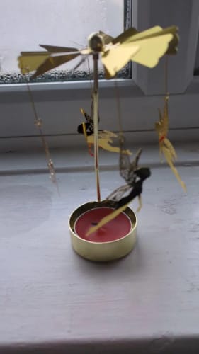 Customer photo review of 1pc Metal Hot Rotating Candle Holder Christmas Rotating Candle Holder Dinner Party Wedding Party Candle Holder Decoration Gift