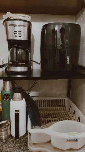 Customer photo review of Estante organizador de metal para microondas