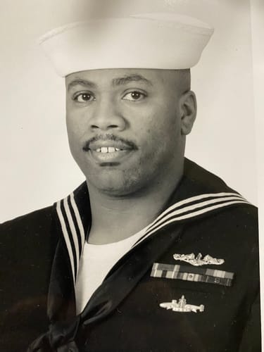 Customer photo review of INRI Cross - Victory Over Sin & Death Necklace: Helps Pair Veterans With A Service Dog Or Shelter Dog