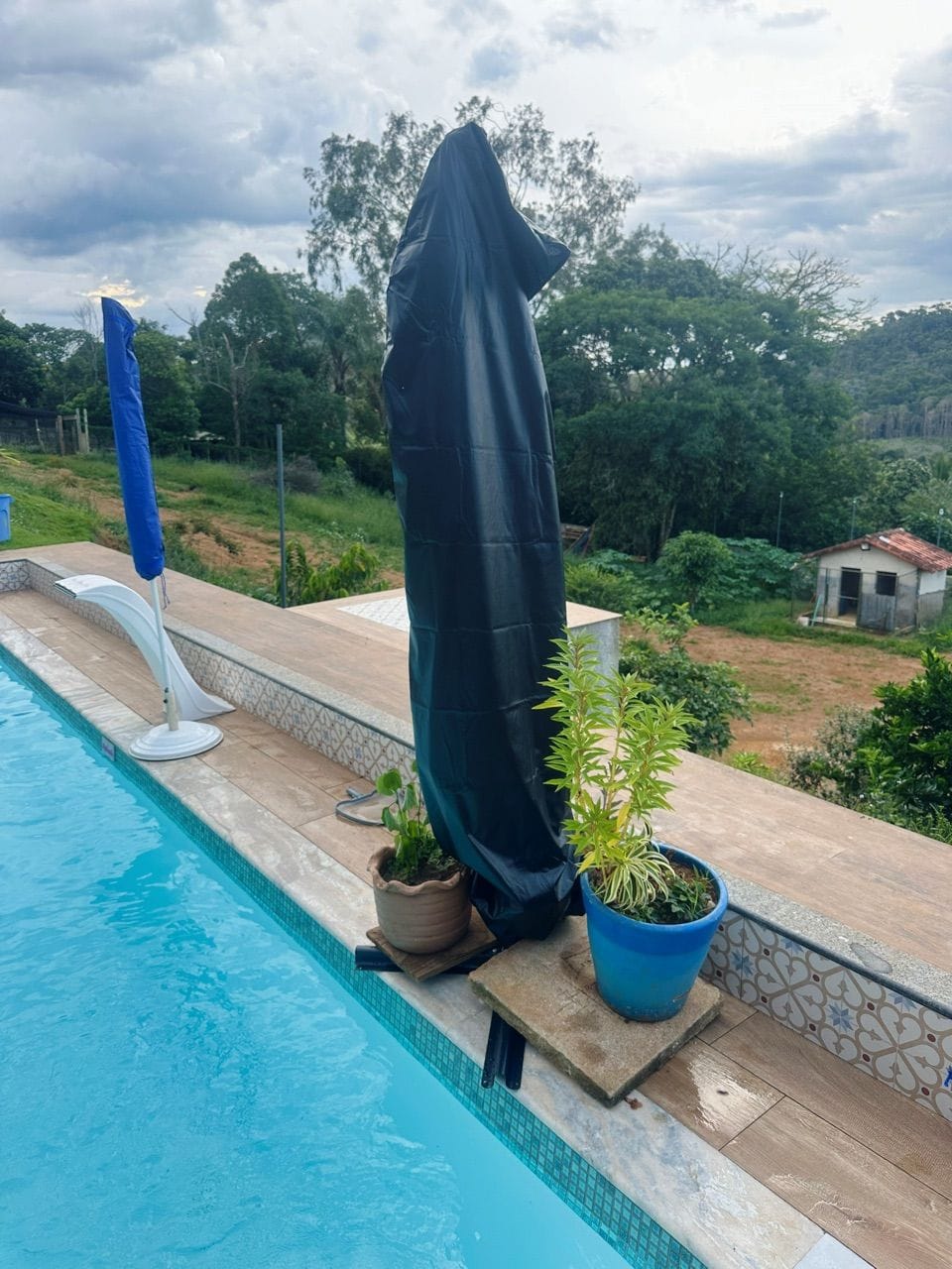 Customer photo review of Capa Impermeável para Guarda-Sol e Ombrelone 210D