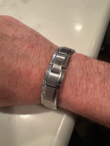 Customer photo review of Iron Man Armor Titanium Magnetic Bracelet: Helps Pair Veterans With A Service Dog Or Shelter Dog