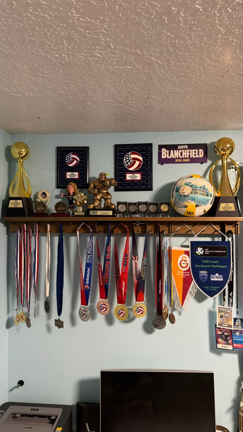 Customer photo review of 4ft Medal Awards Rack Premier Trophy Shelf- Trophy, Plaque and Medal Display