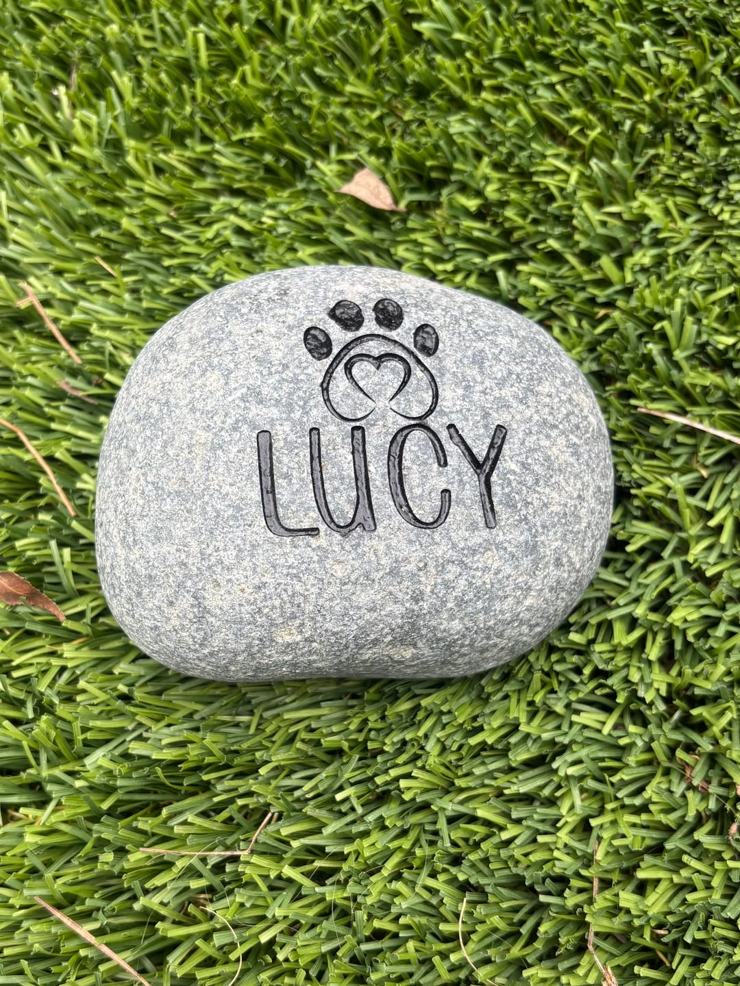 Customer photo review of Dog headstones Grave Marker Custom Engraved Pet Memorial River Rock Stone Heart Paw Print