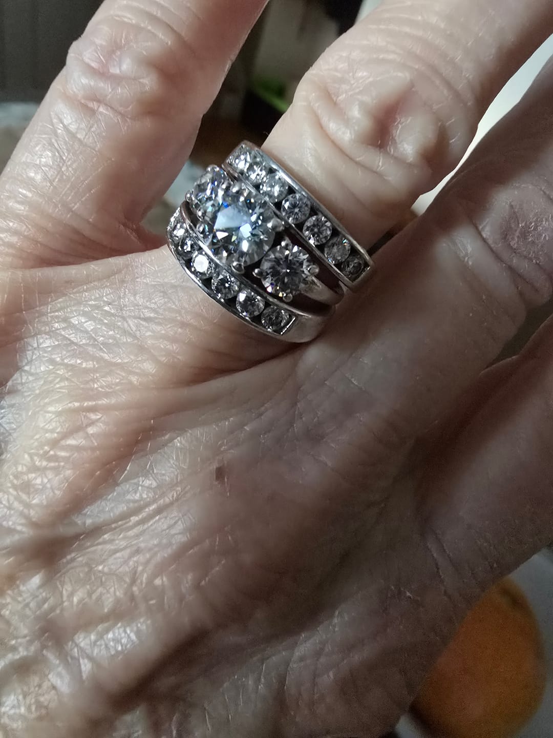 Customer photo review of Channel Set Moissanite Half Eternity Wedding Band Ring In Sterling Silver