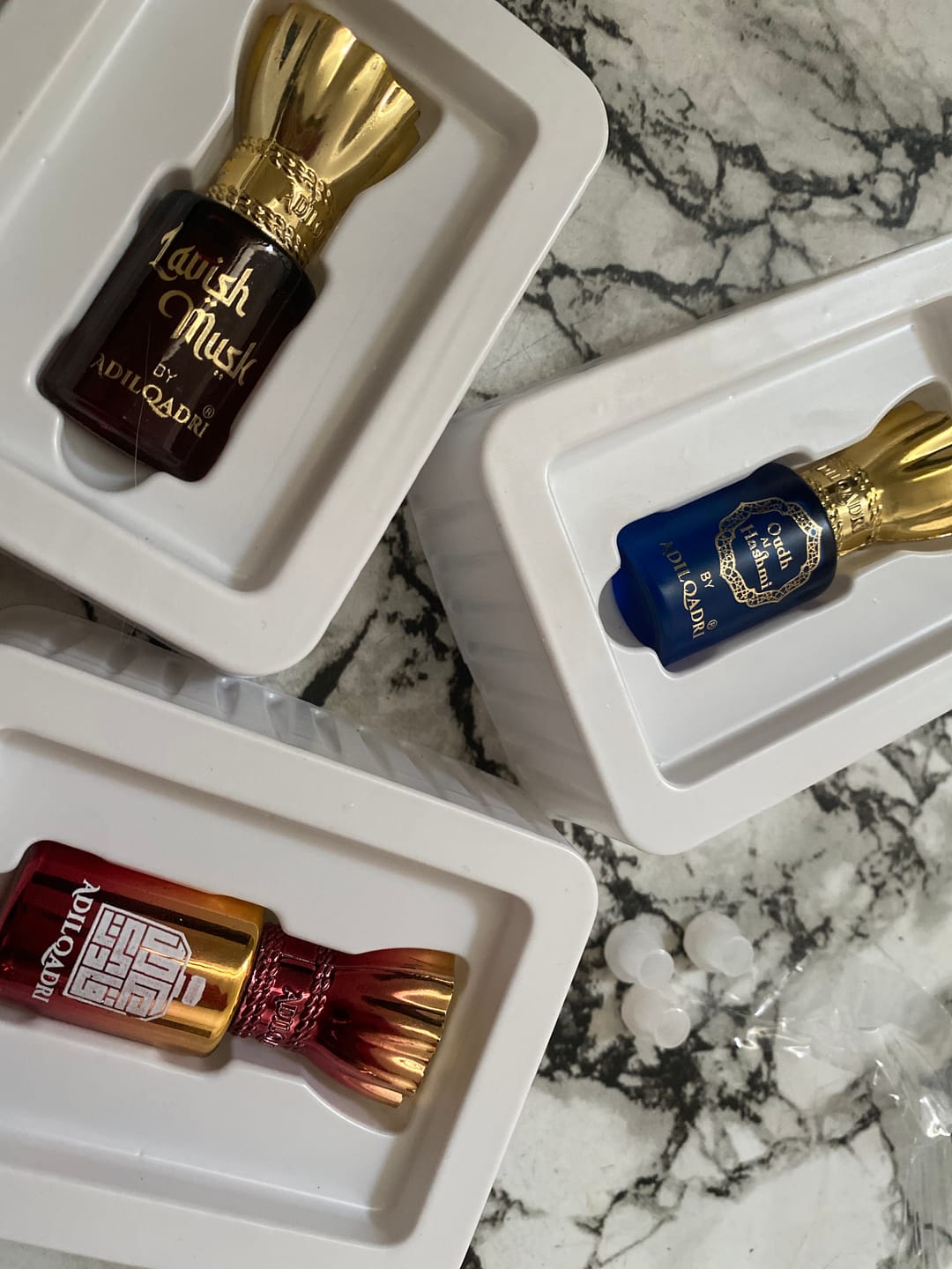 Customer photo review of 3 Pcs Attar Set Shanaya, Lavish Musk And Oudh Al Hashmi 5.5 Ml Each