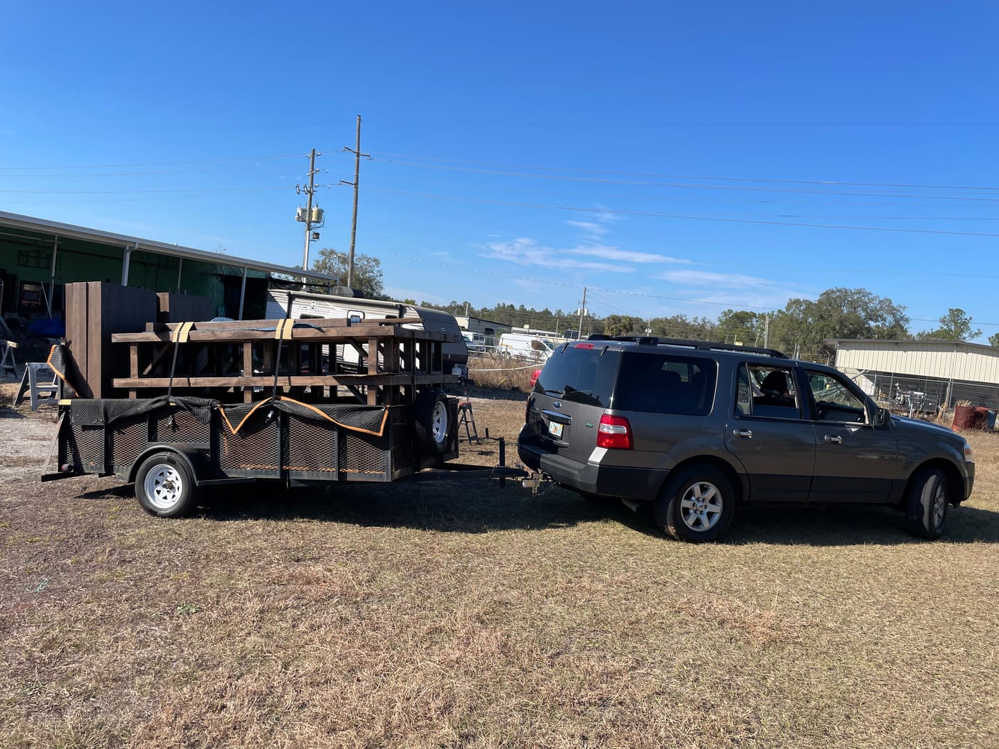 Customer photo review of TorkStrap M500 | 14'x1'' Spring Loaded Tie Down Straps - Adapts to Load Shifts - 1500lbs Max Load - Just Pull Alternative to Ratchet Straps with Hooks - For Securing Motorcycles, Kayaks, ATVs