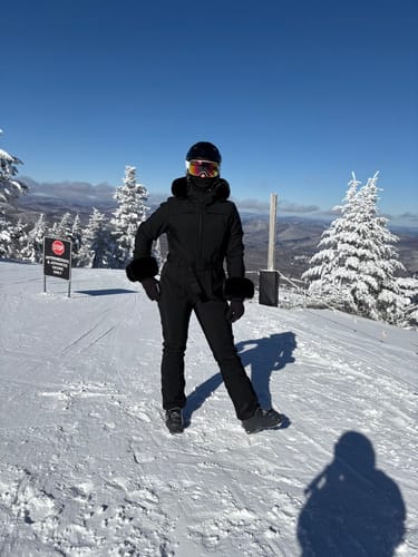 Customer photo review of Women's Black Faux Fur Shirred Waterproof One-Piece Ski Suit