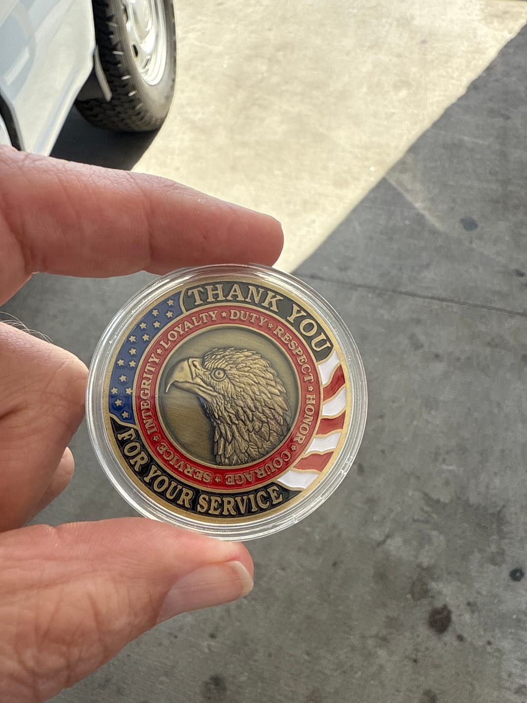 Customer photo review of Honoring All Who Served Thank You Coin