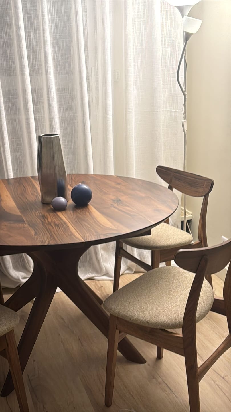 Customer photo review of Bibi Extendable Round Dining Table in Solid Walnut