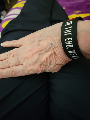 Customer photo review of We Win Wristband