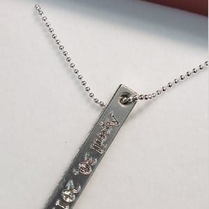 Customer photo review of Dainty Engraved 3D Bar Necklace