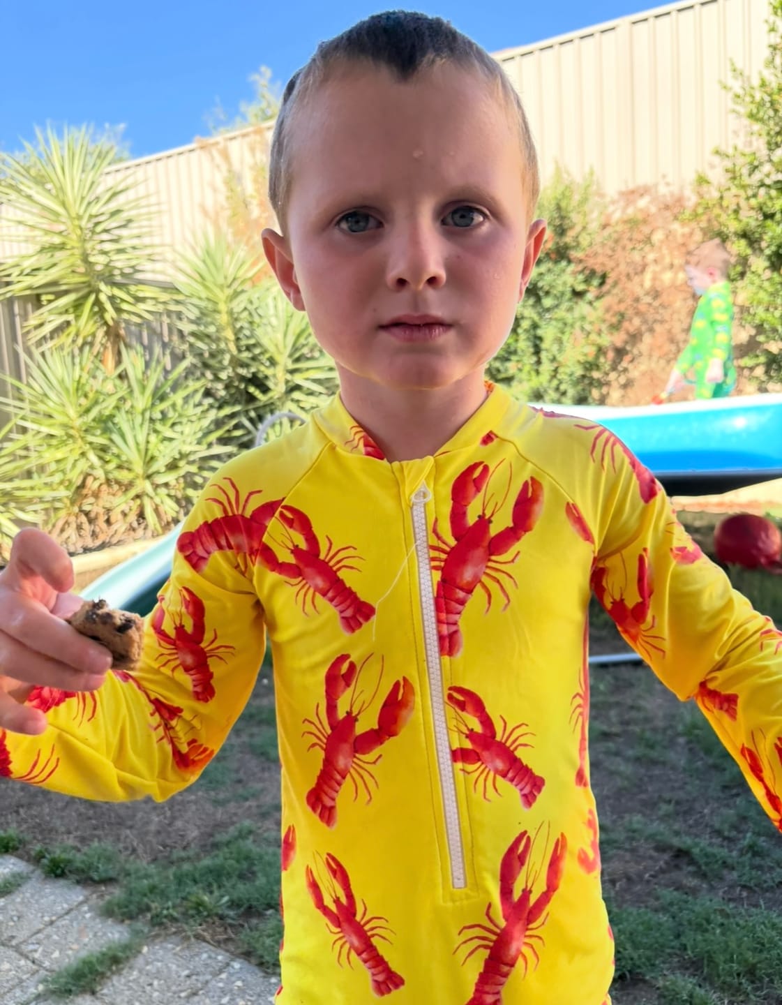 Customer photo review of Bright Lobster Unisex Long Sleeve Zip Swimmers