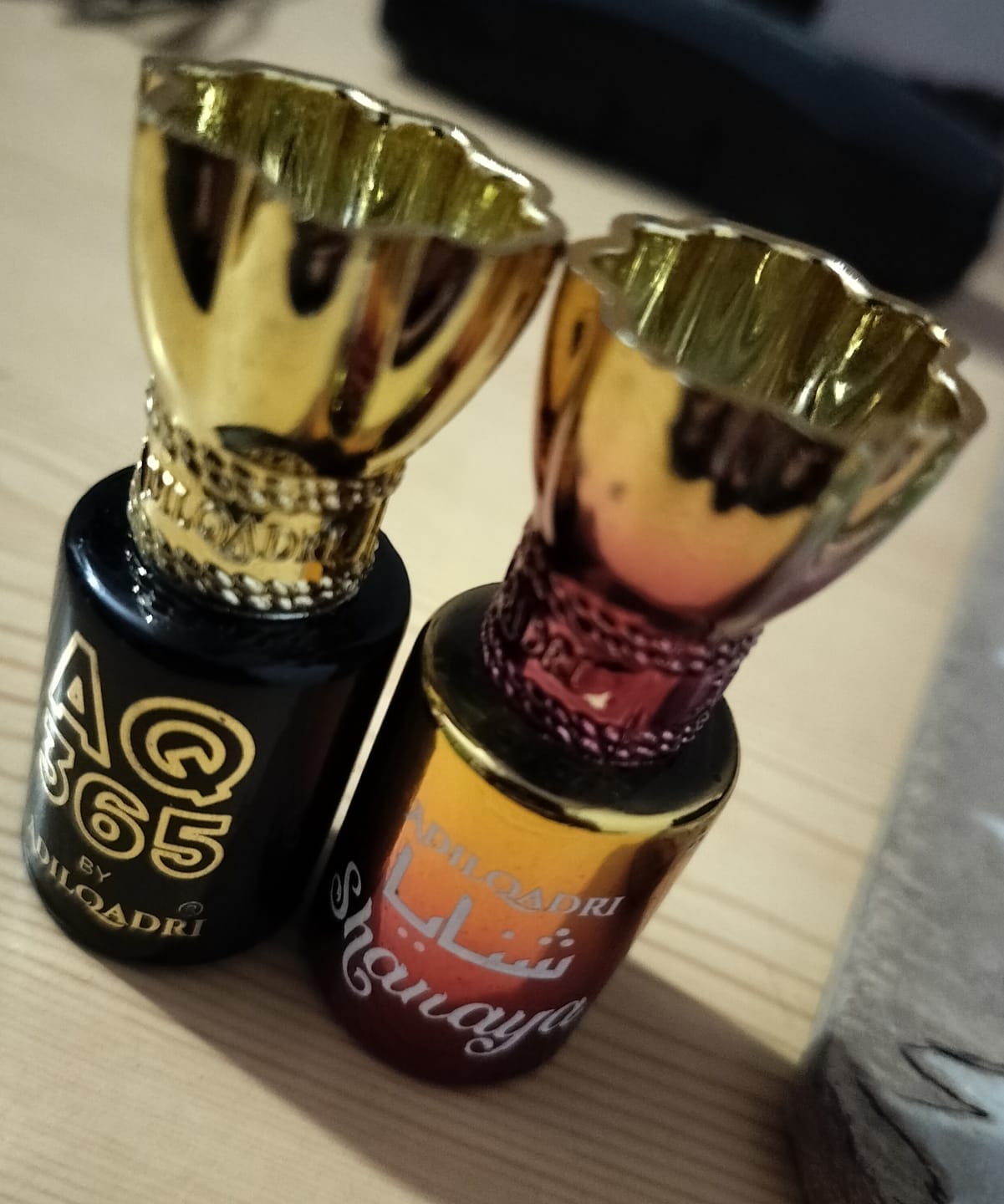 Customer photo review of 2 Pcs Attar Set Shanaya And AQ 365 5.5 Ml Each