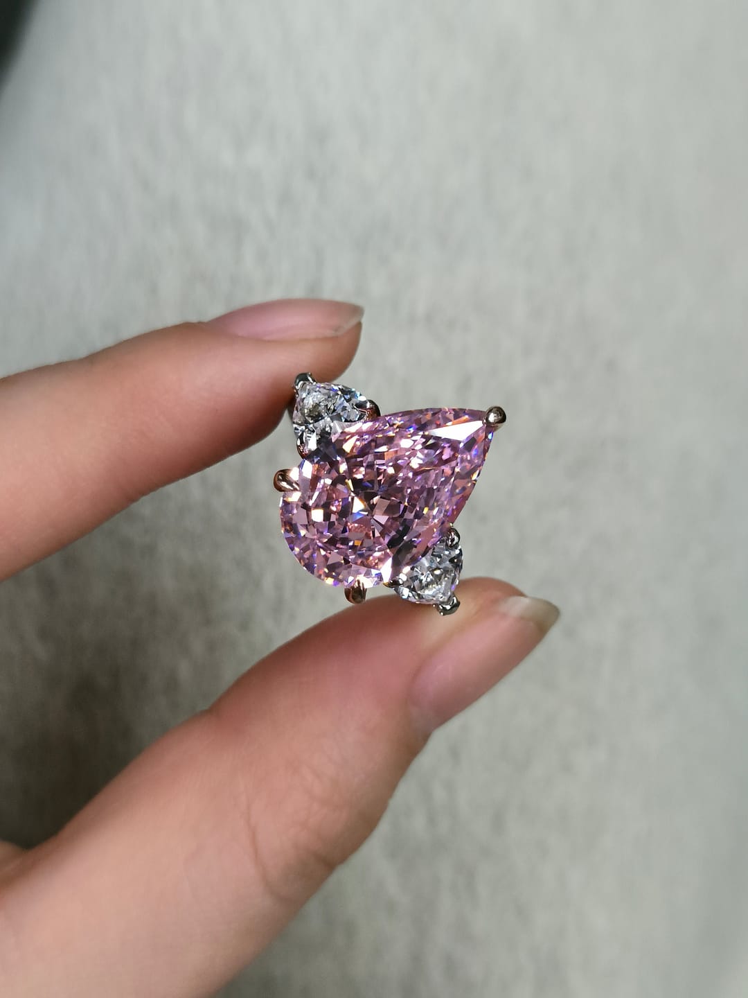 Customer photo review of S925 Stunning Pear Cut Yellow/Pink Sapphire Three Stone Engagement Ring