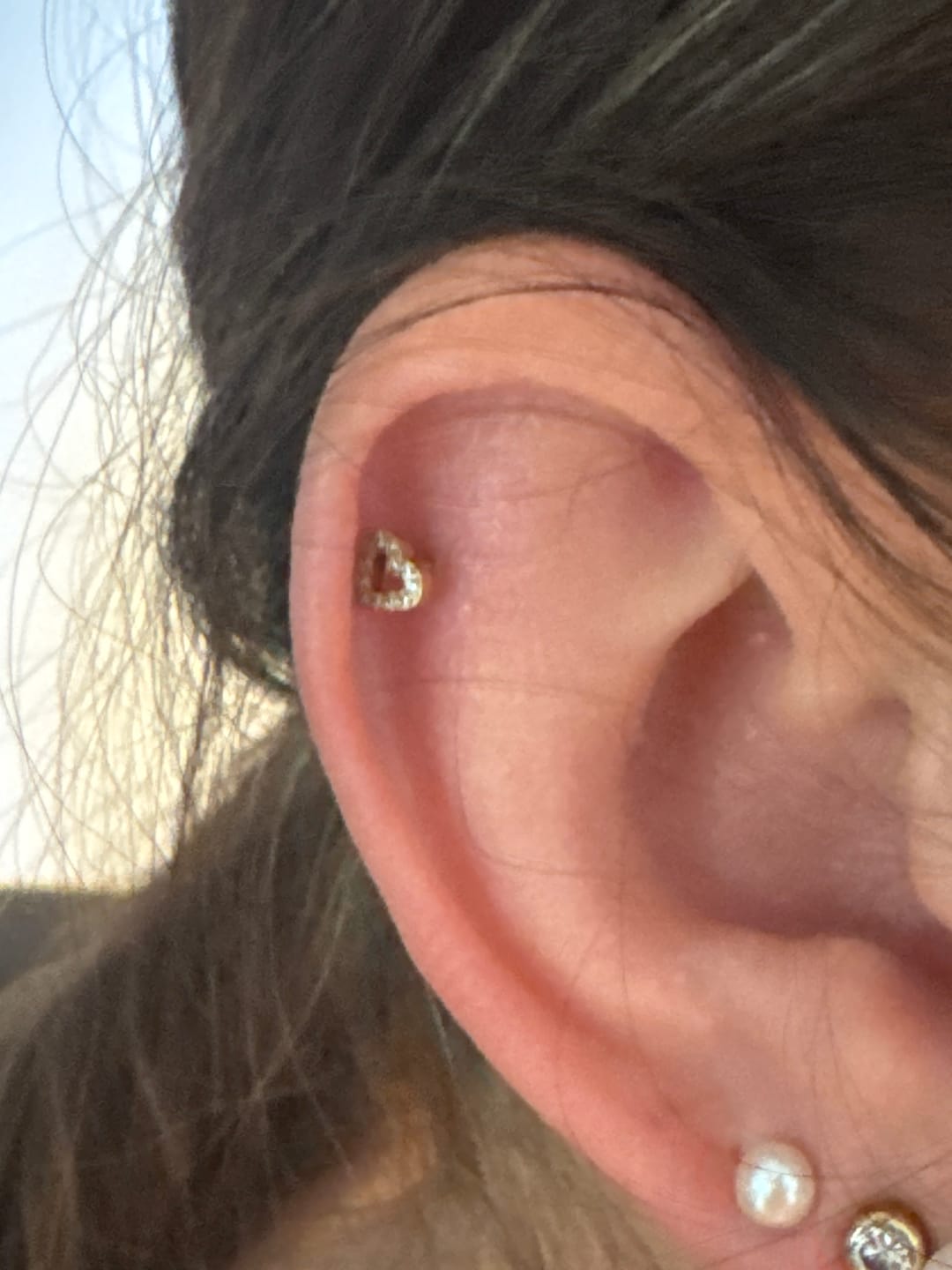 Customer photo review of Heart Piercing | Titan