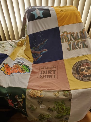 T-shirt quilt with travel, fishing themes by Carol from FL