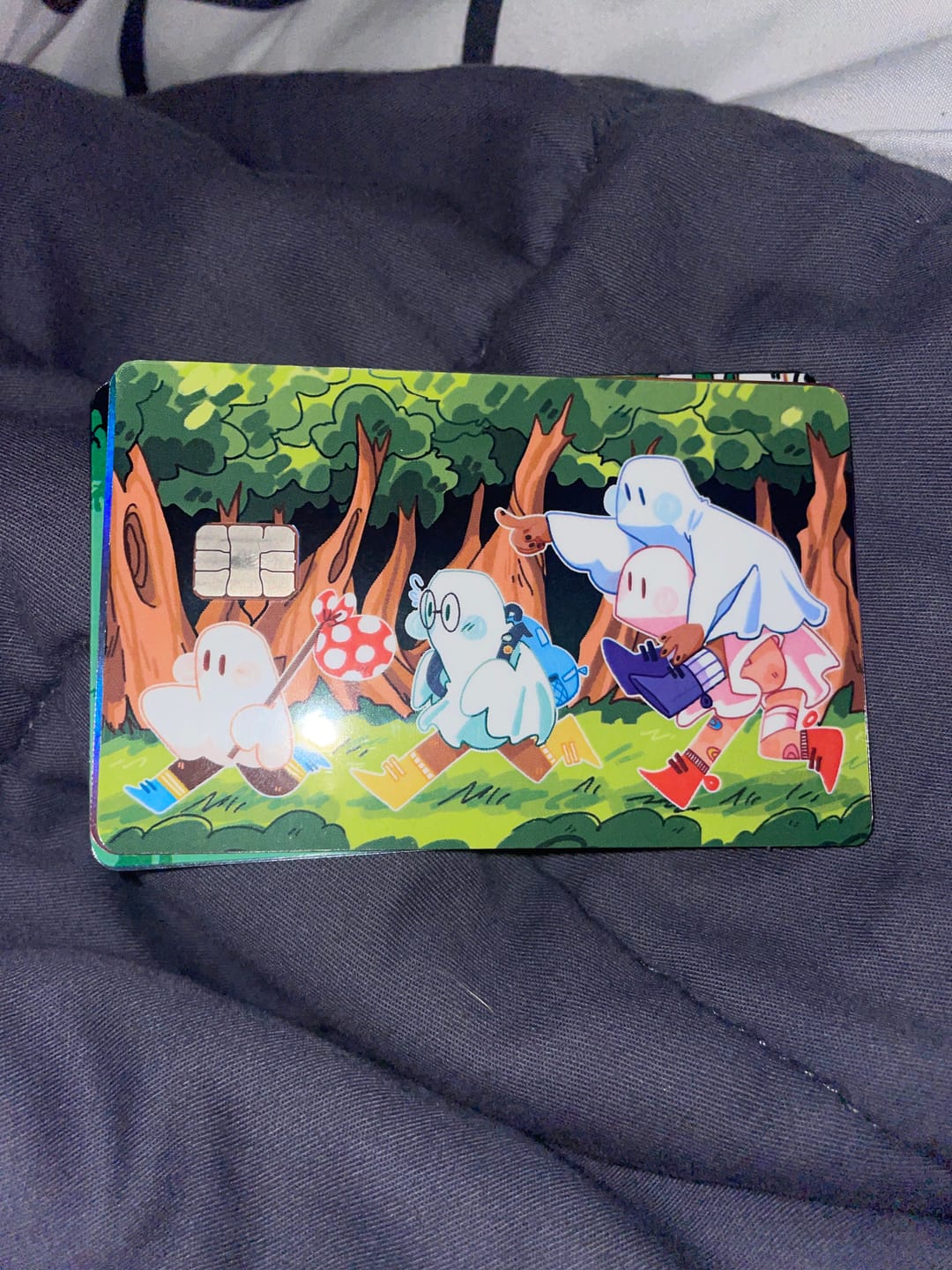 Customer photo review of Runaway Ghosts Credit Card Skins