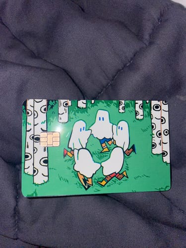 Customer photo review of Circle Ghosts Credit Card Skins