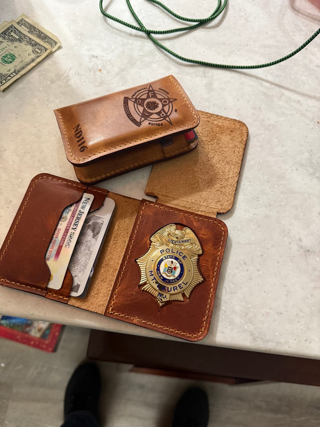 Customer photo review of The Tyler Vertical Wallet