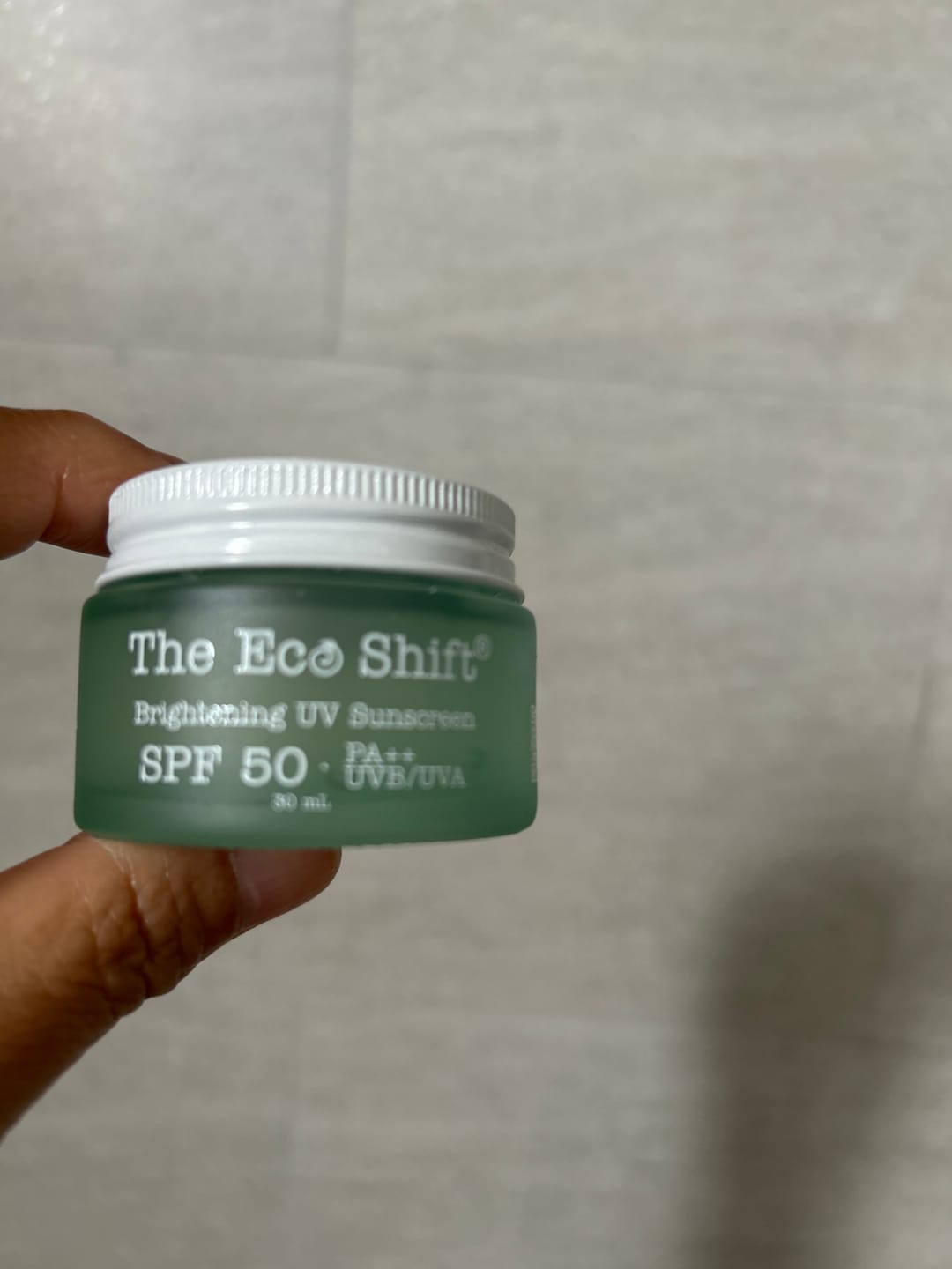 Customer photo review of Brightening UV Sunscreen & Skin Primer with SPF 50
