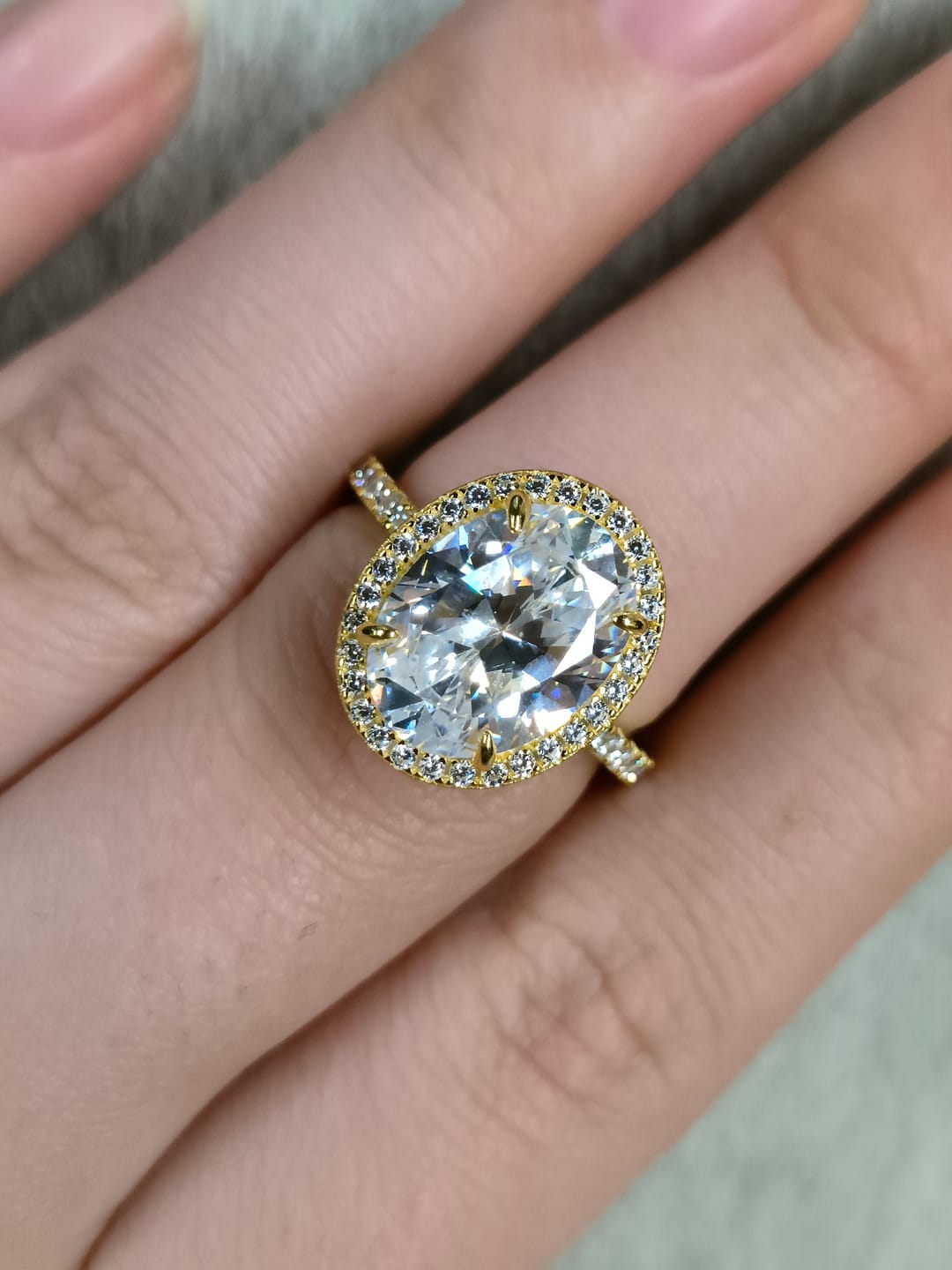 Customer photo review of Louily Halo 3.5Ct Oval Cut Simulated Diamond Engagement Ring In Sterling Silver