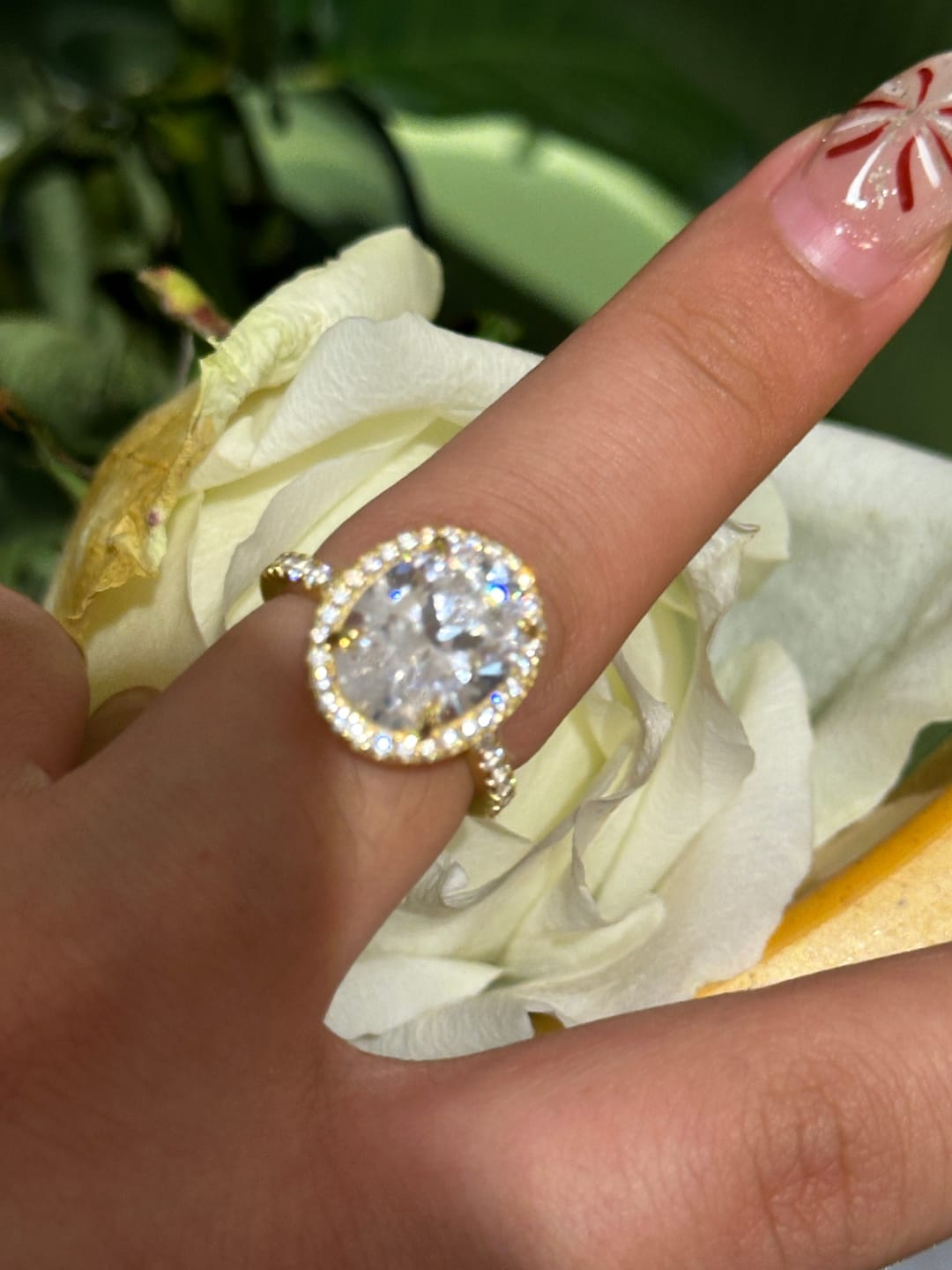 Customer photo review of Louily Halo 3.5Ct Oval Cut Simulated Diamond Engagement Ring In Sterling Silver