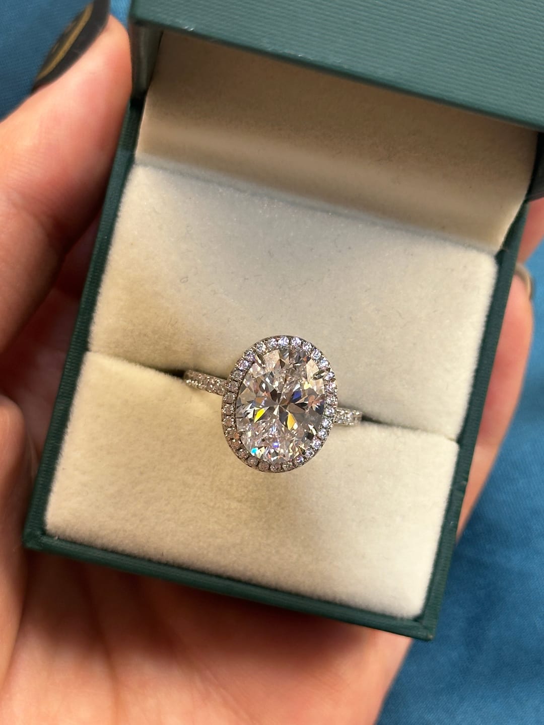 Customer photo review of Louily Halo 3.5Ct Oval Cut Simulated Diamond Engagement Ring In Sterling Silver