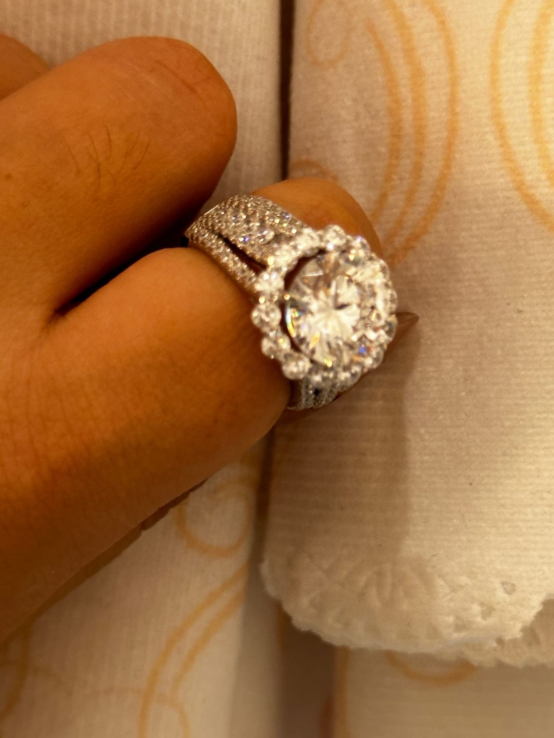 Customer photo review of Louily Unique Halo Design Round Cut Engagement Ring In Sterling Silver
