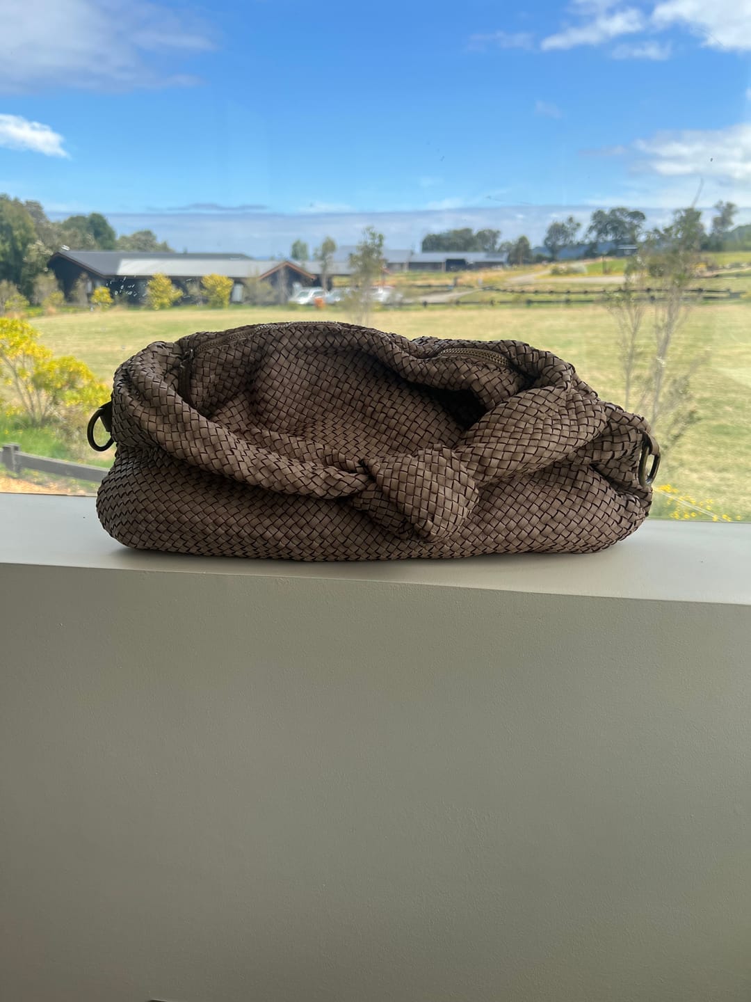 Customer photo review of Cartera tejido Cuero Visón