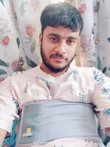 Customer photo review of Rib Belt | Provides Moderate Support to the Injured Ribs & Allows Normal Respiration (Grey)