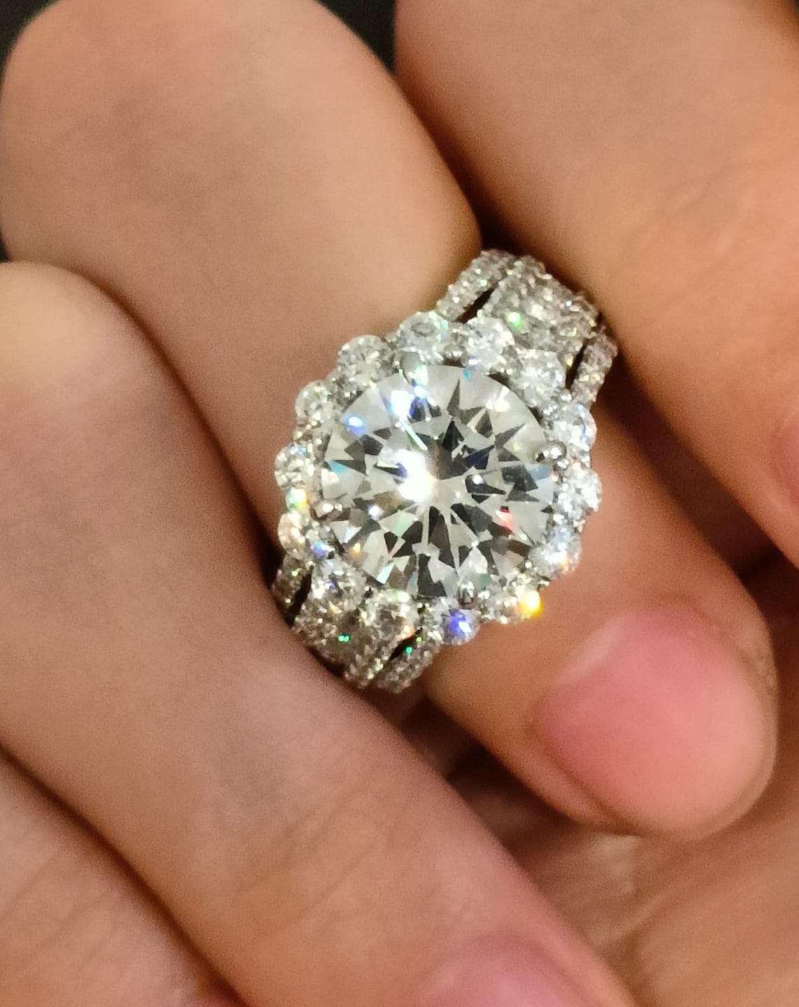 Customer photo review of Louily Unique Halo Design Round Cut Engagement Ring In Sterling Silver