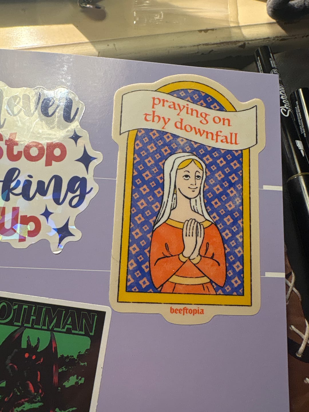 Customer photo review of Praying For Thy Downfall Sticker