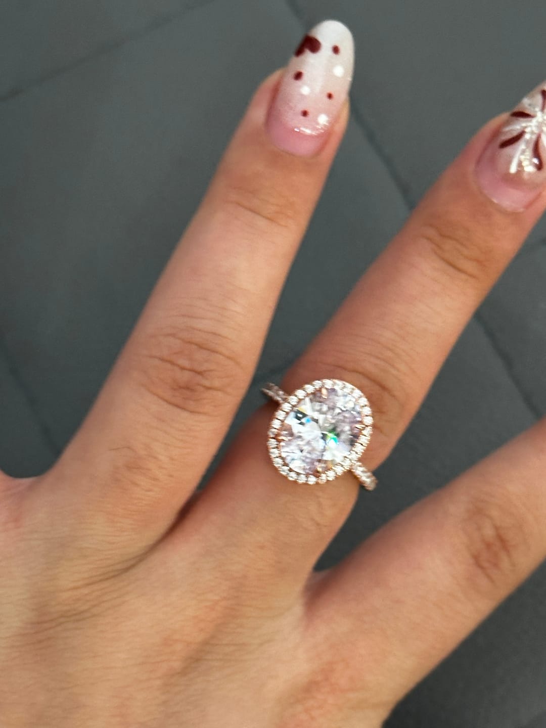 Customer photo review of Louily Halo 3.5Ct Oval Cut Simulated Diamond Engagement Ring In Sterling Silver