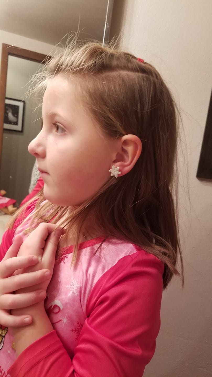 Customer photo review of Snowflake Studs Hypoallergenic Earrings for Sensitive Ears Made with Plastic Posts