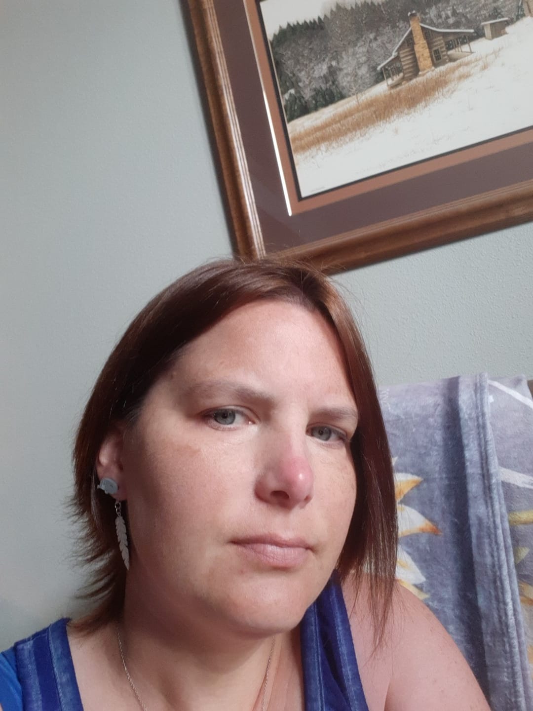 Customer photo review of Dainty Feather Dangles Hypoallergenic Earrings for Sensitive Ears Made with Plastic Posts