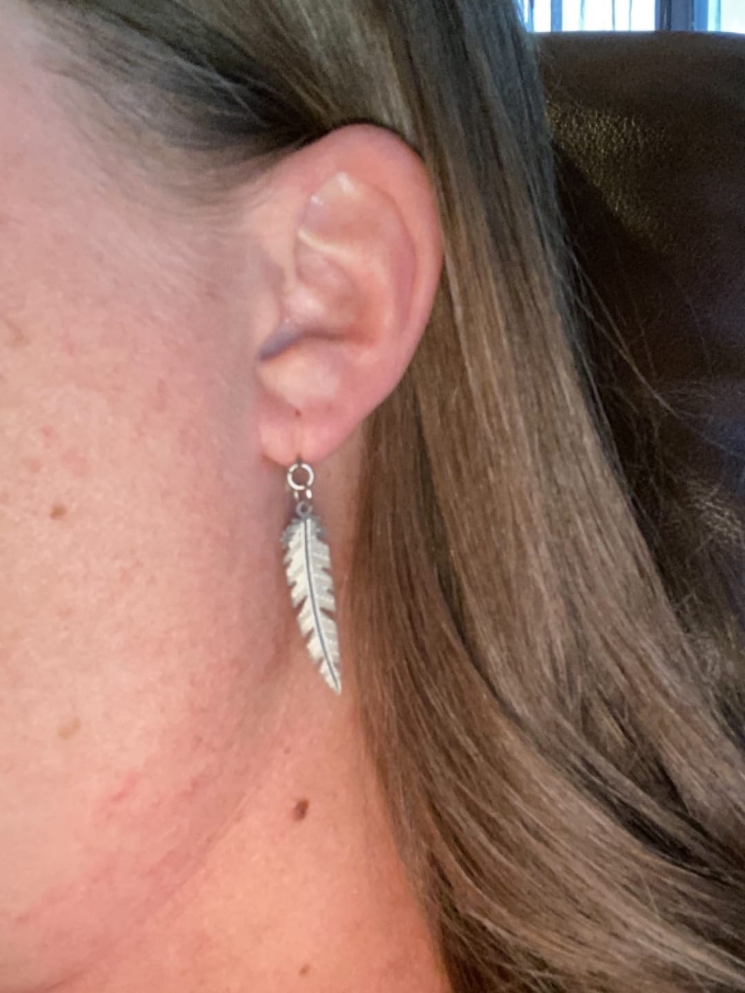 Customer photo review of Dainty Feather Dangles Hypoallergenic Earrings for Sensitive Ears Made with Plastic Posts