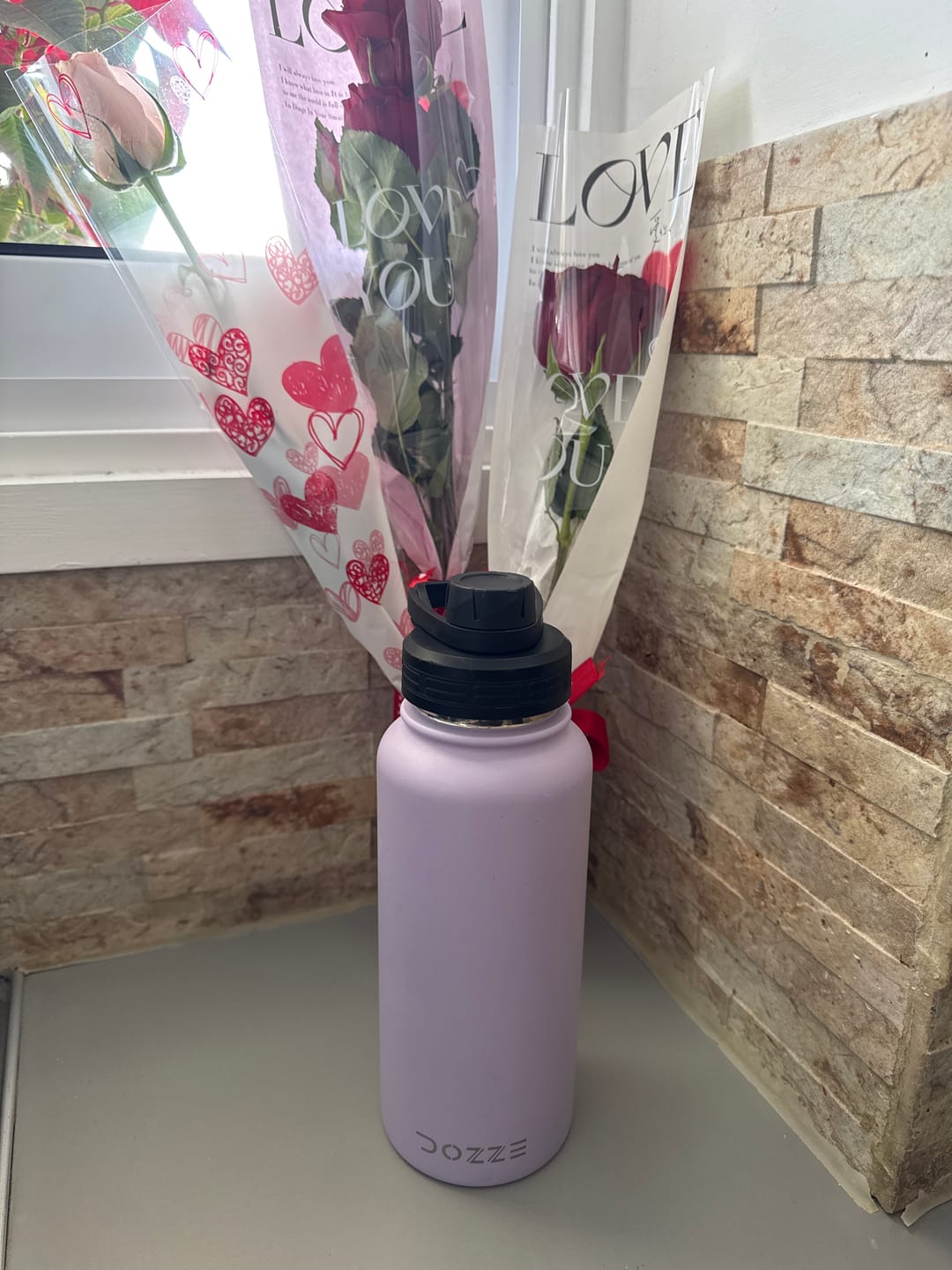 Customer photo review of DOZZE Water Bottle Sport Lid