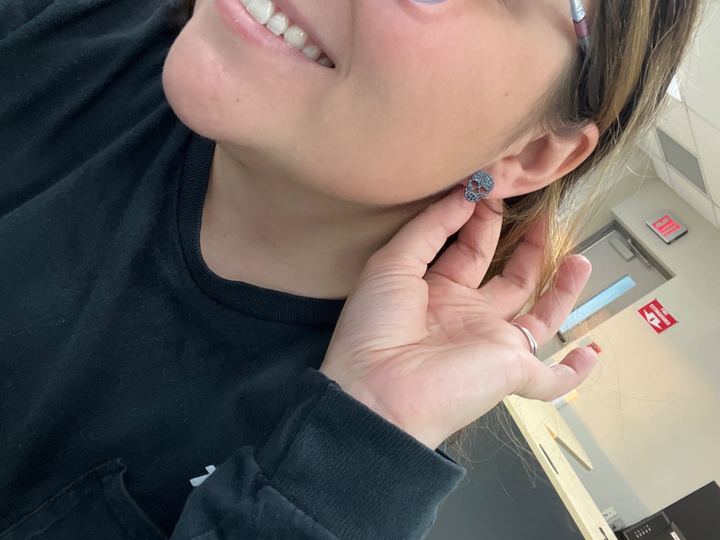 Customer photo review of Skull Studs Hypoallergenic Earrings for Sensitive Ears Made with Plastic Posts