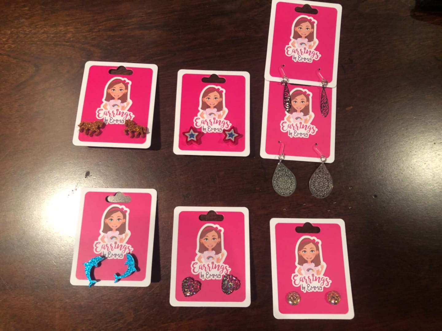 Customer photo review of Dolphin Studs Hypoallergenic Earrings for Sensitive Ears Made with Plastic Posts