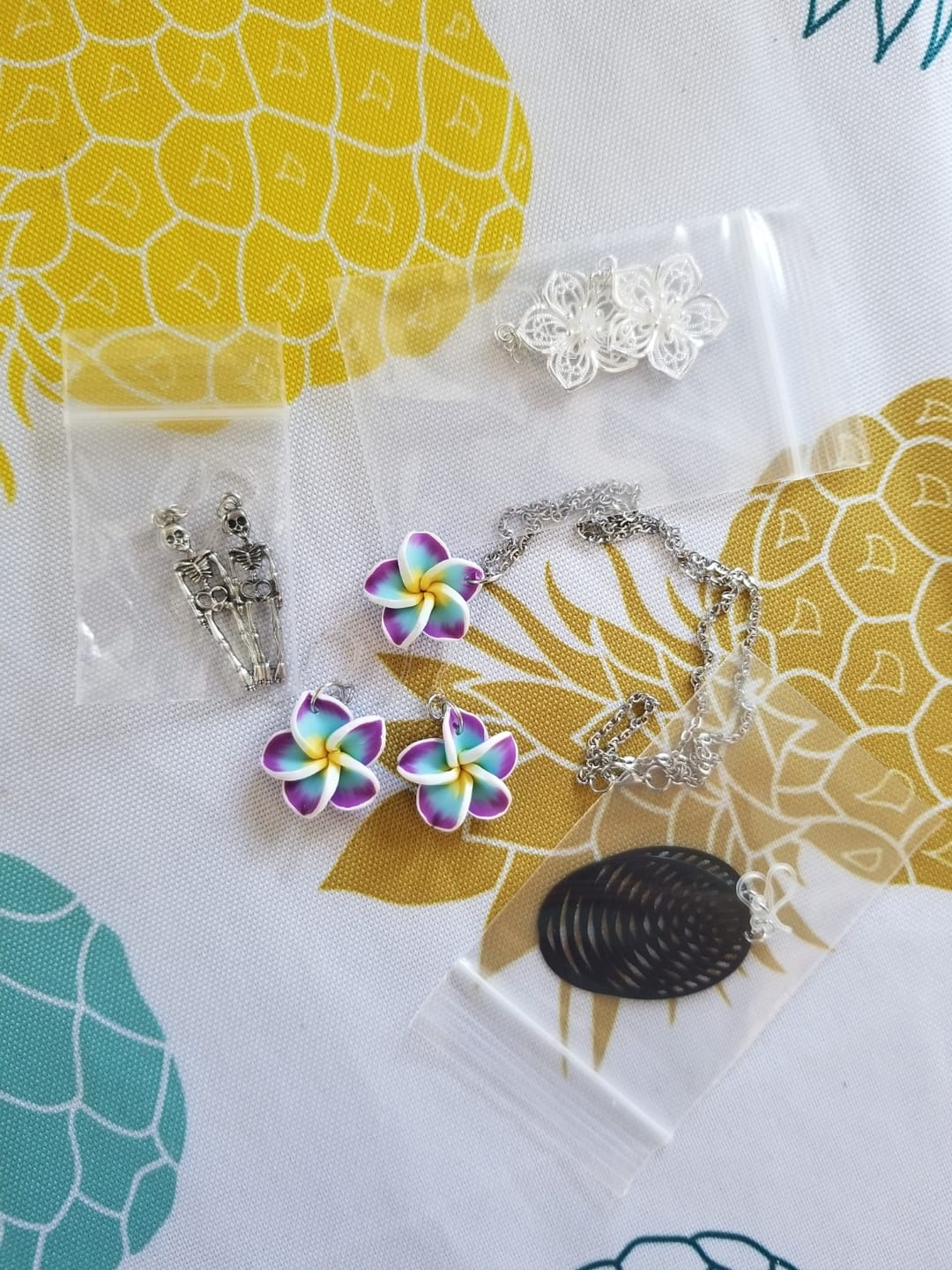 Customer photo review of Silver Skeleton Dangles Hypoallergenic Earrings for Sensitive Ears Made with Plastic Posts