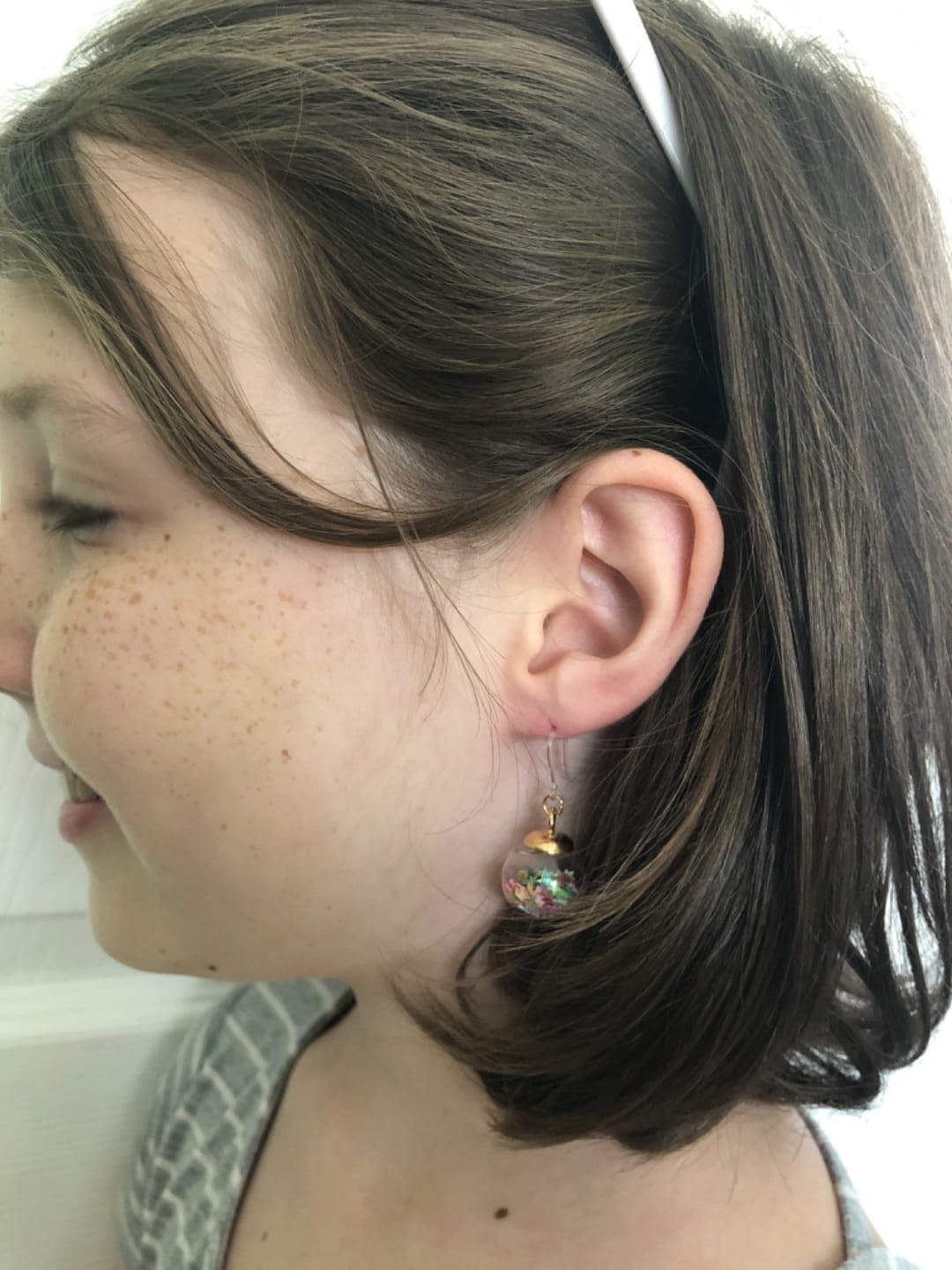 Customer photo review of Wish Upon a Star Dangles Hypoallergenic Earrings for Sensitive Ears Made with Plastic Posts