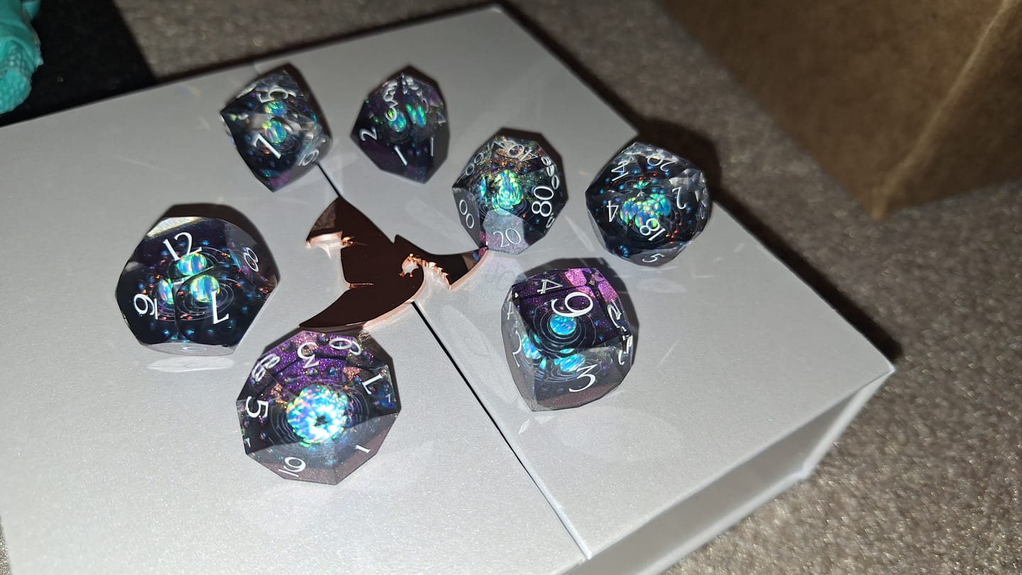 Customer photo review of URWizards D&D Multi-faceted Real Opal Gemstone Bead Dice Set