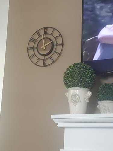 Customer photo review of Wood and Metal Wall Clock