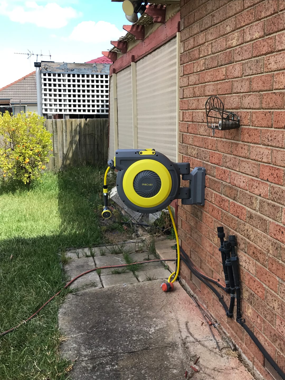 Customer photo review of 30m Retractable Garden Hose Reel.. Fully Installed