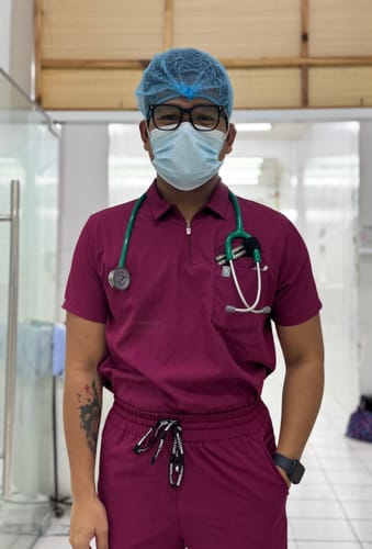 Customer photo review of Zip-Up Polo MoveTech® Scrub Top - Men / Garnet