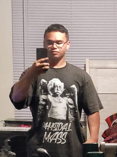 Customer photo review of washed t-shirt (physical mass)