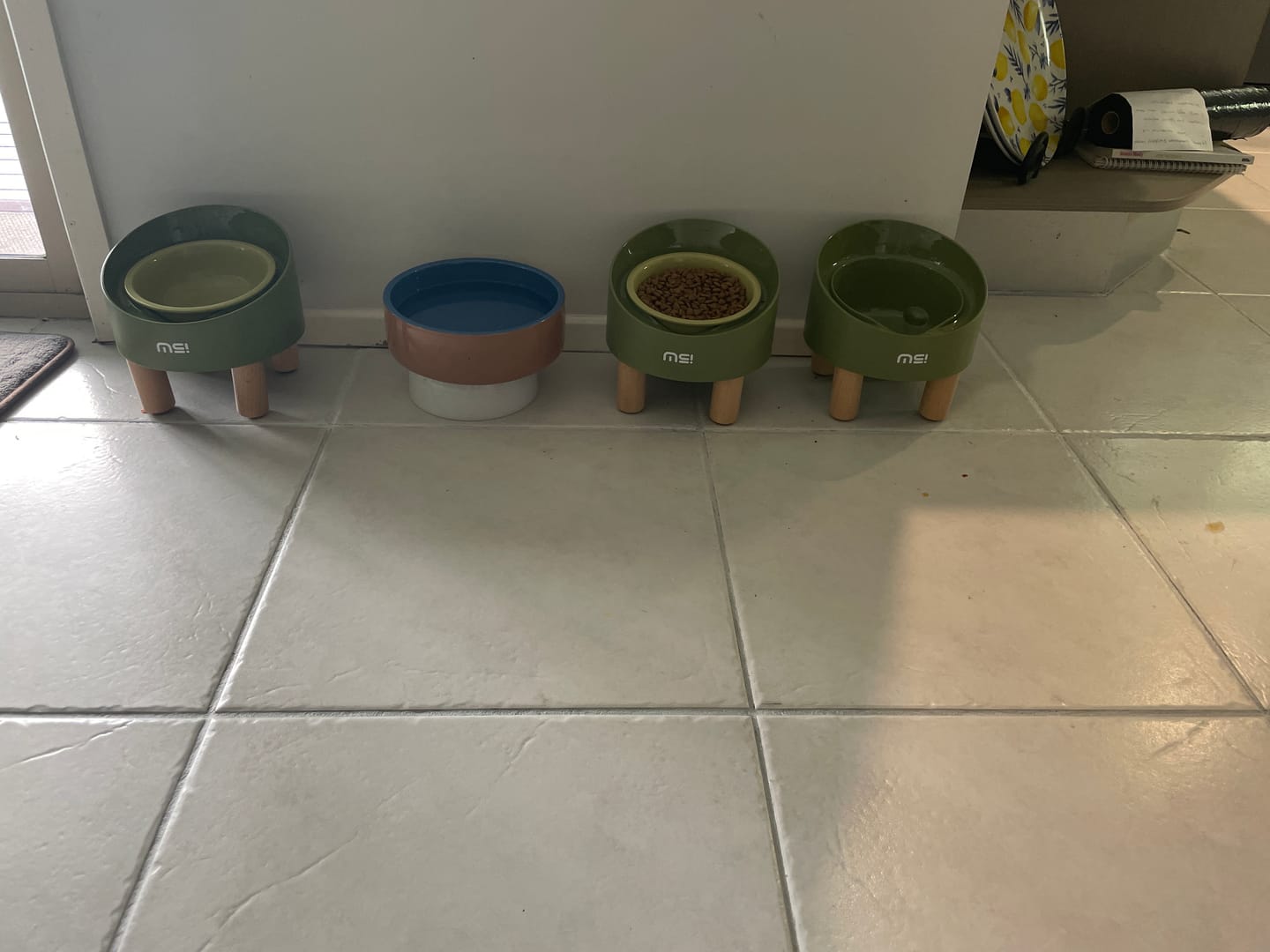 Customer photo review of Makesure Rolls Elevated Ceramic Pet Bowl with Wooden Stand