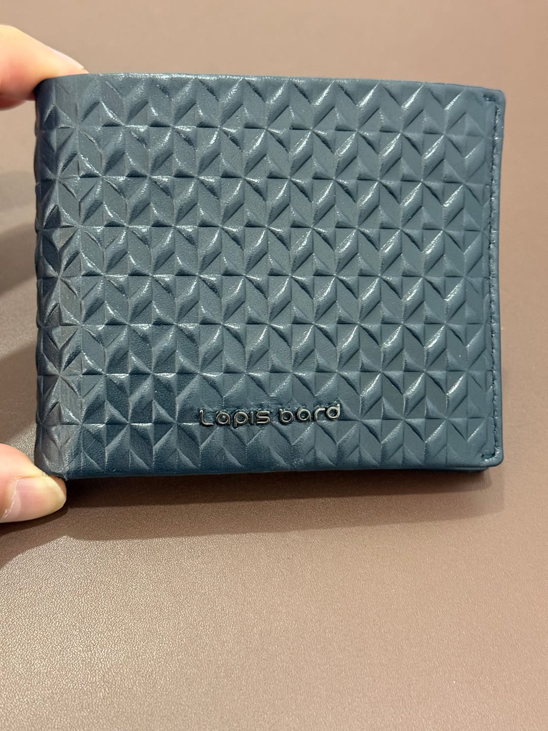Customer photo review of Enigma Bi-Fold Wallet