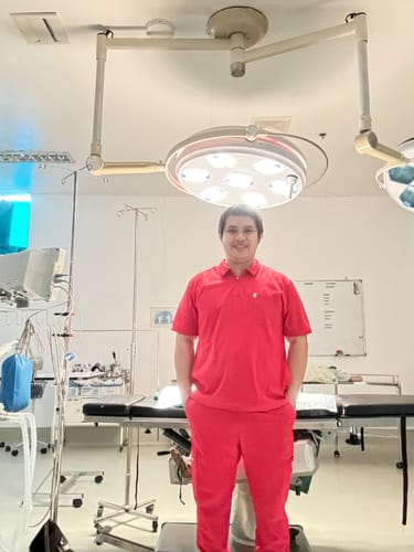 Customer photo review of Zip-Up Polo MoveTech® Scrub Top - Men / Cherry Pop