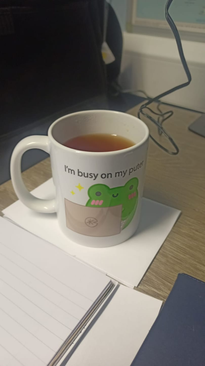 Customer photo review of I'm Busy On My Puter Albert Mug